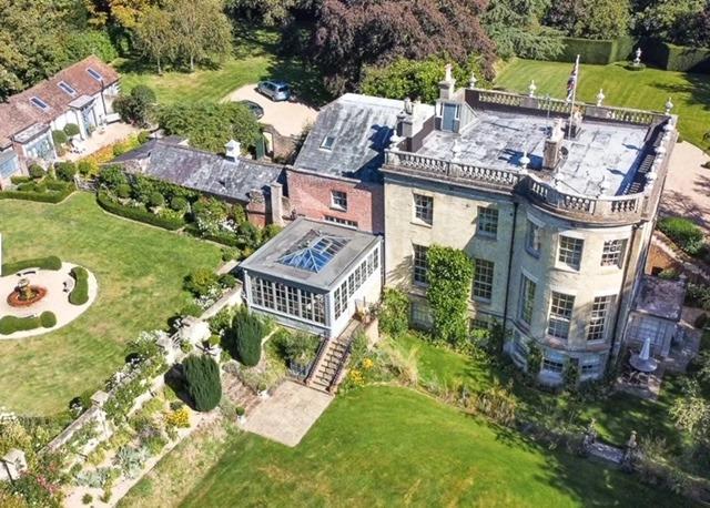 The house is set in extensive grounds