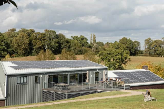 The solar panels on the roofs of the winery buildings on the Albourne Estate  