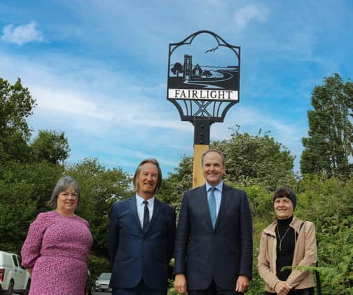 Annette Holmes, Deputy Chair, and Chris Smart, Chair of the Fairlight Residents Association,  Andrew Blackman, the Lord-Lieutenant of East Sussex, and Maggie Barnby, designer of the sign.