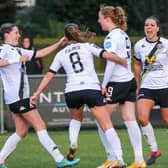 Lewes celebrate the Emily Kraft goal that earned an FA Cup victory away to Ipswich | Picture: James Boyes