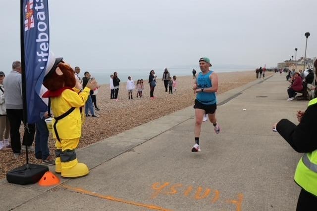 Action and finishers at the Seaford 10k