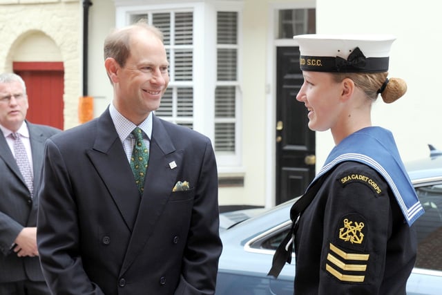 Lieutenant Sonya Seggie from Worthing Sea Cadets greeting the Earl on his arrival at Pallant House