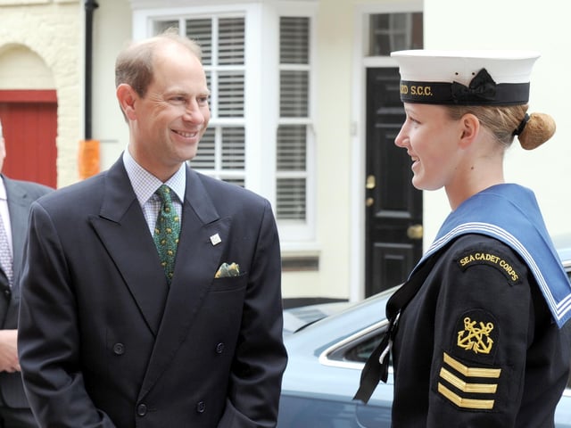 Lieutenant Sonya Seggie from Worthing Sea Cadets greeting the Earl on his arrival at Pallant House