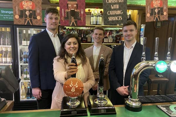 Three Acre Brewery directors join MP Nus Ghani to pul the first Parliamentary pint