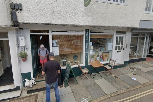 The top review says 'a charming cafe/deli, serving a great choice of sandwiches (served with crisps and a small salad)'.