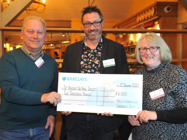 St Vincent De Paul Society with judge Steve Young, receiving £2,000 to purchase white goods for families who are unable to source them themselves