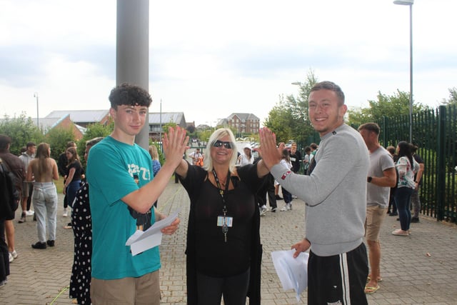 Bexhill Academy students with their GCSE results