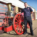 Charity car wash at Bexhill fire station on October 7 2023. The car wash was in aid of The Fire Fighters Charity and also for the Merryweather restoration project.Bexhill's original 1895 horse-drawn Merryweather fire engine is pictured here with Andy Hewson.
