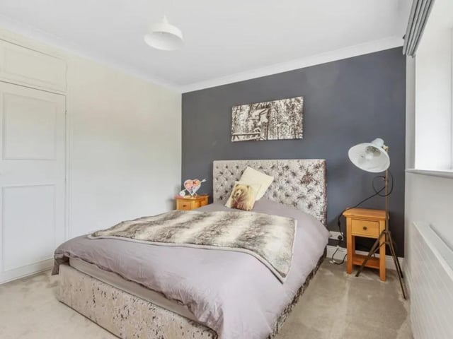 One of the four bedrooms.