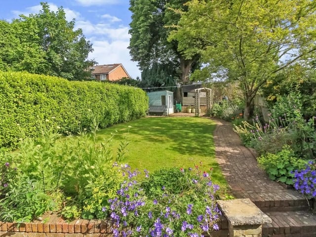 The enclosed private rear garden is approximately 95ft