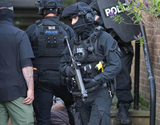 East Sussex car fire and fight sparks armed police search
