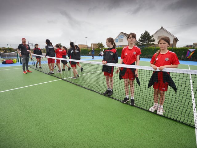 Culture Secretary Lucy Frazer marks the refurbishment of 1,000 public tennis courts. Photocall on June 29 at the tennis courts on Royal Parade, Eastbourne, with children from Bourne Primary School and Scott Lloyd, CEO Lawn Tennis Association.