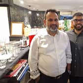 Darchini owner Syed Hossain with his son Fahim. Photo: Sussex World