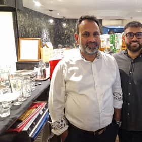 Darchini owner Syed Hossain with his son Fahim. Photo: Sussex World