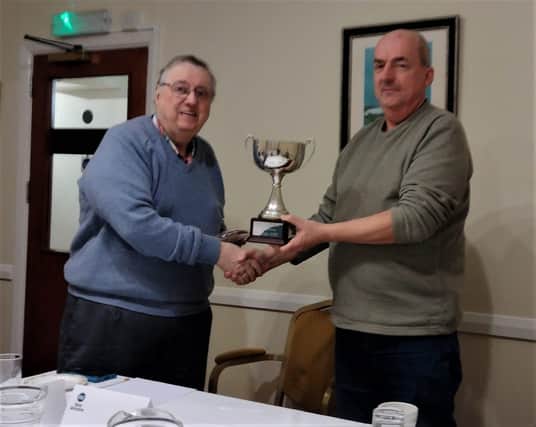 Phil Moon  (L), President of the Eastbourne Hospital Radio,  presented the Phil Moon Cup to Mark Abbott,  the station's engineer for exceptional service over many years. 