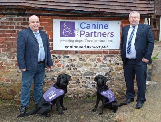 L-R David Watson, Corporate Relationship Manager at Canine Partners, David Glover, Joint CEO of Caremark Limited.  
