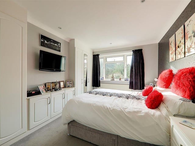 This three-bedroom detached house with feature garden has come on the market with Bacon and Company with a guide price of £725,000