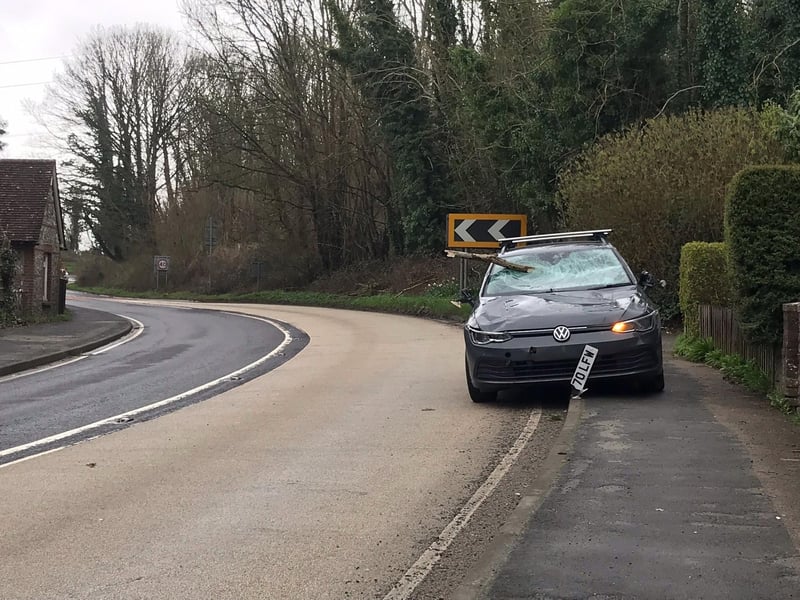 A woman had her car windscreen smashed by a tree branch whilst she was driving to see her parents in Ditchling.
