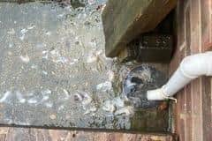 People living in the Wealden village say their sewage system cannot cope with new houses being connected to it.