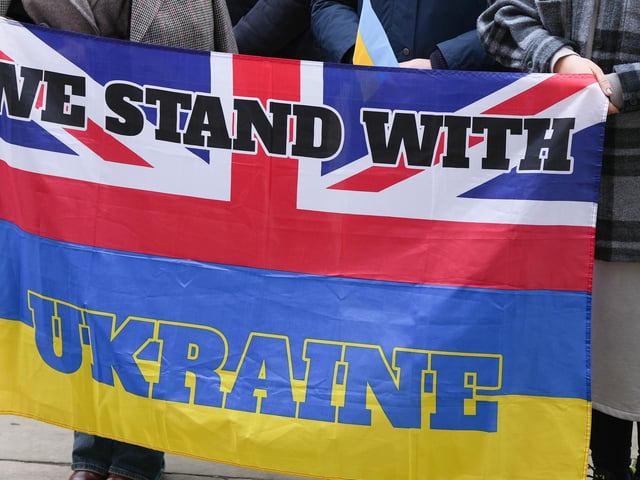 Dozens gathered outside Worthing Town Hall at 11am for a minute’s silence and prayer to mark one year since the Russian invasion of Ukraine began