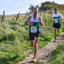 Mikeey Kwoka (034) leading Ali Watrous (025) for Chichester at the Steepdown Challenge
