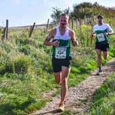 Mikeey Kwoka (034) leading Ali Watrous (025) for Chichester at the Steepdown Challenge