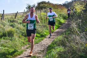 Mikeey Kwoka (034) leading Ali Watrous (025) for Chichester at the Steepdown Challenge