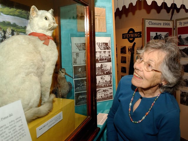 Steyning Museum volunteer Marjorie Walker with one of the Walter Potter pieces on display in June 2005