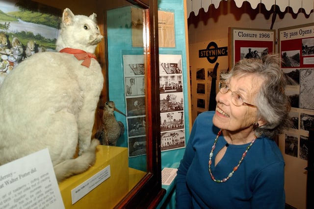 Steyning Museum volunteer Marjorie Walker with one of the Walter Potter pieces on display in June 2005