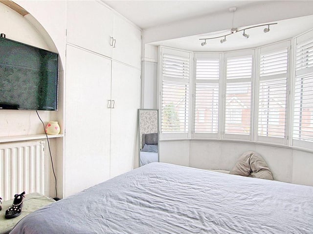 Located close to the railway station and town centre, this property has spacious accommodation over three floors and a large back garden.