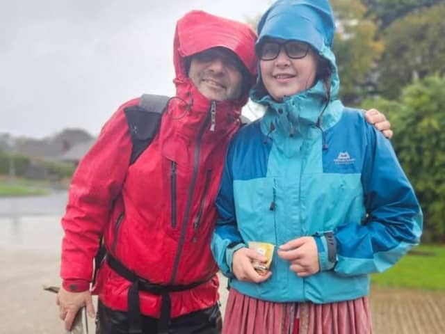 Becky and dad Albert had a stormy start to the walk on Saturday