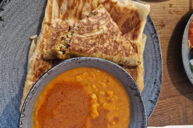 Murtabak – stuffed roti with a choice of filling (lamb or spinach and cheese), served with dhal kari.