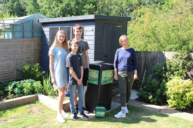 One of Horsham District Council's food recycling champion families with their HOTBIN