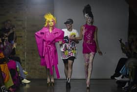 Adam with models during London Fashion Week