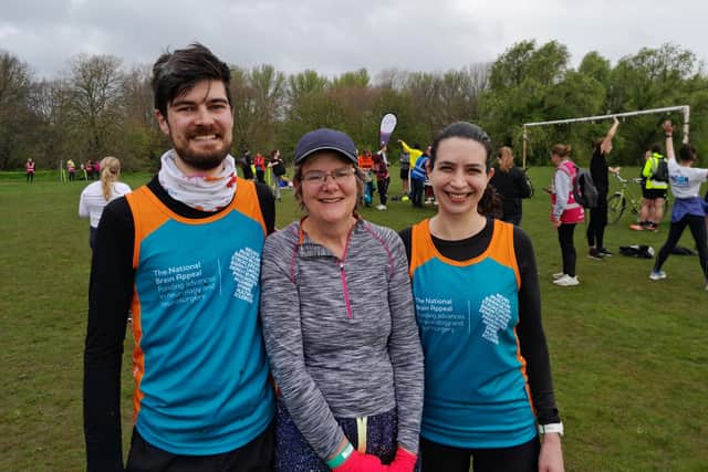 Helena Clarke with son Matthew and his partner Janina, who ran the London Marathon with Team Rare Dementia Support for The National Brain Appeal