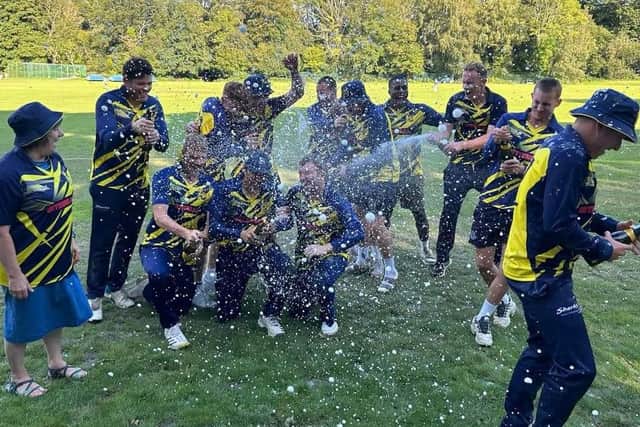 Hastings Priory players celebrate promotion after beating Brighton | Picture: Hastings Priory CC