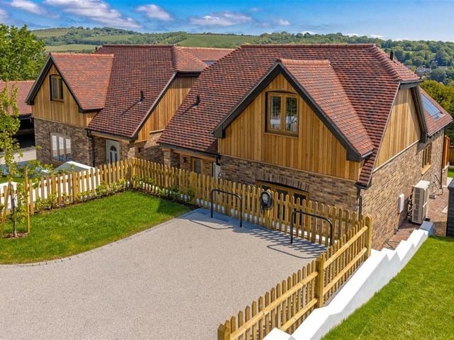 Offers in excess of £900,000 are invited for this new luxury property in Mill Lane, High Salvington. It has beautiful views over the South Downs, versatile and spacious accommodation.