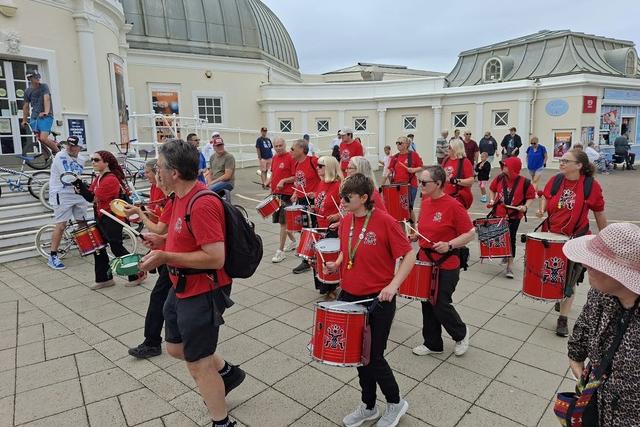 Celebration Samba parading on Worthing seafront in July 2025