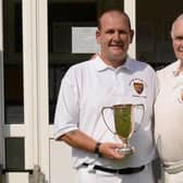 Stewart Angus, holding the Seaford BC Pairs trophy with Ted Pattinson | Contributed picture