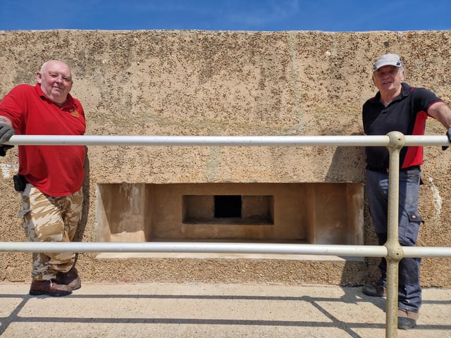 Pete Coe, one of the project leaders, and fellow former Royal Engineer Graham Cosham worked together to open the southern embrasure at the Ferring pillbox