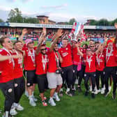 Crawley Town held a promotion party at the Broadfield Stadium on Monday night to celebrate winning the League Two play-off final at Wembley. Players and staff paraded the trophy to 2,000 fans and signed autographs and took selfies.