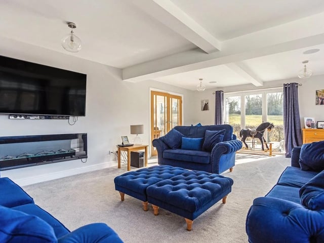 The second reception room is currently being used as a family room