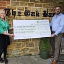 Cheque presented from St Peter &amp; St James Hospice