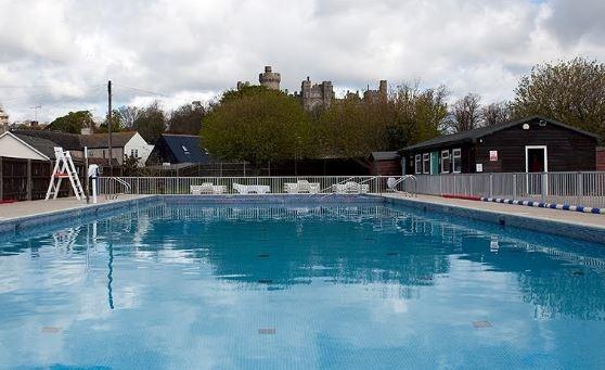 Nestled in the picturesque town of Arundel, this outdoor pool offers stunning views of the surrounding countryside and a family-friendly atmosphere. Picture: Google Maps