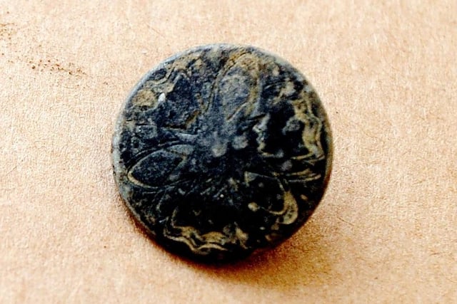 A post-Medieval engraved button found during the dig