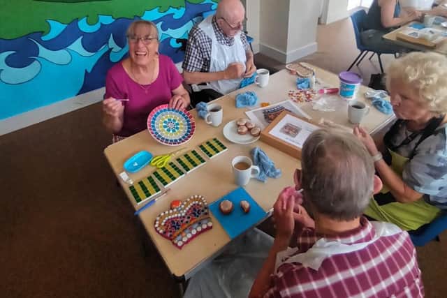 Volunteers and blind veterans enjoying some mosaic crafting at the Brighton Arts and Crafts Group