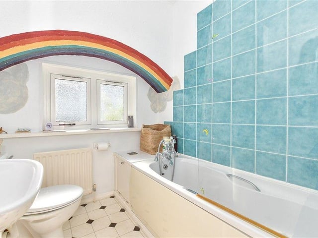The family bathroom with three-piece suite