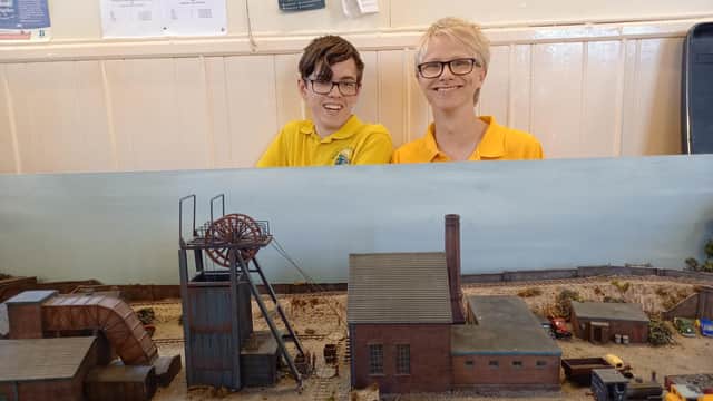 Max Goodwin and Leo Hunt with Leo's O. L. King Cole mine layout