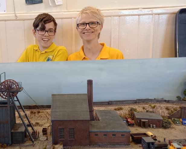 Max Goodwin and Leo Hunt with Leo's O. L. King Cole mine layout
