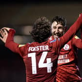 Goalscorers Harry Forster and Jack Roles celebrate against Bristol Rovers on Tuesday night. Picture: Eva Gilbert